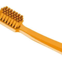 Pomarańczowa szczoteczka do zębów z miękkim włosiem. "Szczoteczka soft co to znaczy?" - to delikatna dla dziąseł i szkliwa.